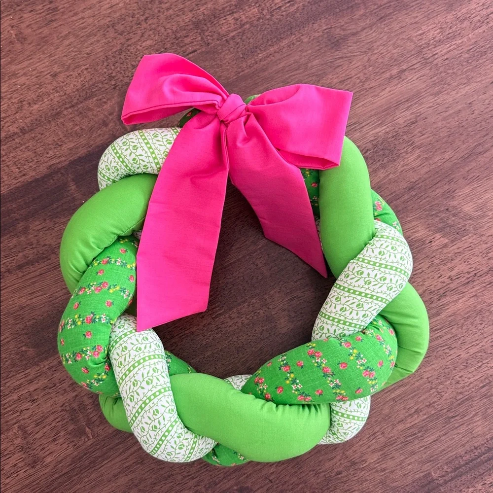 Vintage braided fabric plush wreath with pink ribbon
